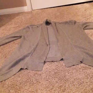 A classy grey jacket/ cover over blouse